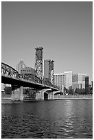 Williamette River at Hawthorne Bridge and high-rise buildings. Portland, Oregon, USA ( black and white)