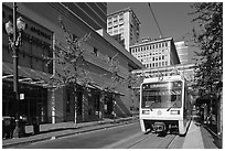 Street with tram, downtown. Portland, Oregon, USA (black and white)