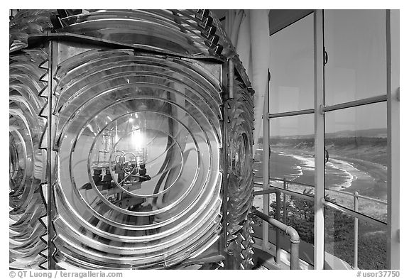 Light inside Cape Blanco Lighthouse tower and landscape. Oregon, USA (black and white)