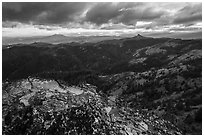 Outcrop and distant Pilot Rock, Boccard Point. Cascade Siskiyou National Monument, Oregon, USA ( black and white)