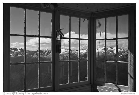 Mountains seen through windows of Hidden Lake Lookout. Washington