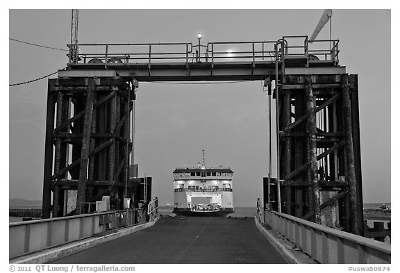 Ferry approaching through gate, Coupeville. Olympic Peninsula, Washington (black and white)