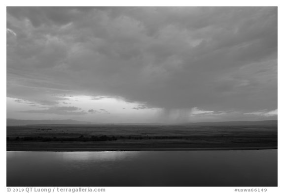 Columbia River and distant rainstorm at sunset, Hanford Reach National Monument. Washington (black and white)