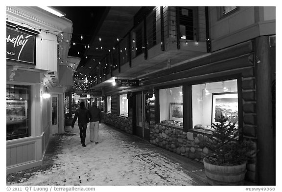Alley with art galleries, winter night. Jackson, Wyoming, USA (black and white)