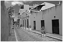 Cobblestone street and colorful houses, old town. San Juan, Puerto Rico ( black and white)