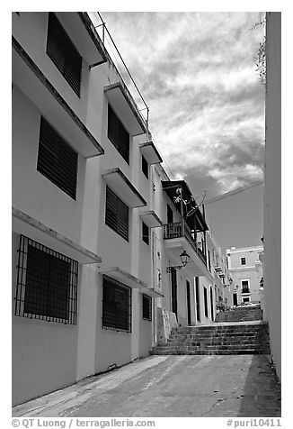 Passage with modern painted houses. San Juan, Puerto Rico (black and white)