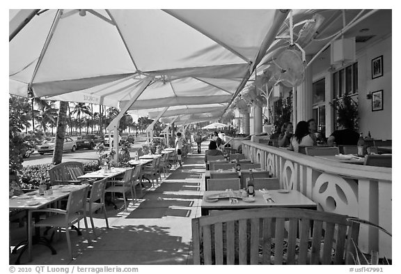 Outdoor restaurant tables, South beach, Miami Beach. Florida, USA (black and white)