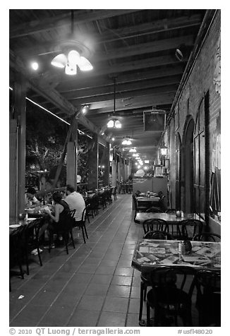 Cuban restaurant at night, Mallory Square. Key West, Florida, USA (black and white)