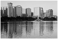 High rise buildings and fountain, lake Eola. Orlando, Florida, USA ( black and white)