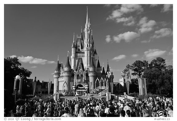 Iconic Cindarella Castle with tourists gathered for show, Magic Kingdom. Orlando, Florida, USA