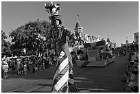 Character on stilts during parade, Main Street. Orlando, Florida, USA ( black and white)