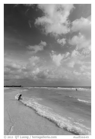 Woman and wave, Fort De Soto beach. Florida, USA (black and white)