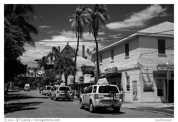 Street with pink cabs. Key West, Florida, USA (black and white)