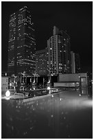 Pool surrouned by high rise towers at night, Miami. Florida, USA ( black and white)