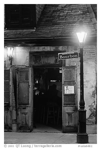 Cafe on Bourbon street at night, French Quarter. New Orleans, Louisiana, USA (black and white)