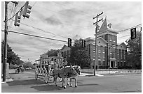 Horse carriage at street intersection. Vicksburg, Mississippi, USA (black and white)
