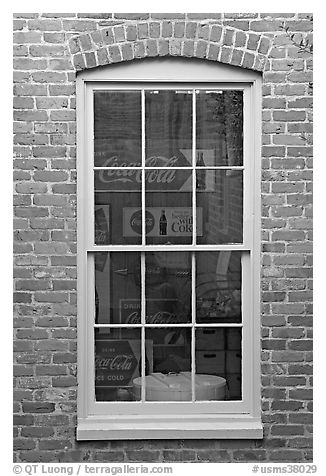 Coca Cola memorabilia seen from window. Vicksburg, Mississippi, USA (black and white)