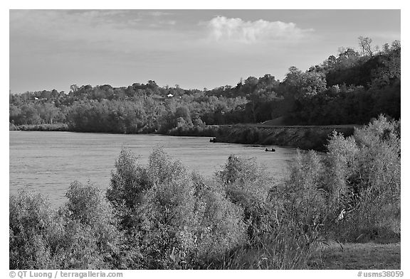 Banks of the Mississippi River with small boat. Natchez, Mississippi, USA (black and white)