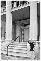 Entrance stairs, door, and columns, Magnolia Hall. Natchez, Mississippi, USA (black and white)