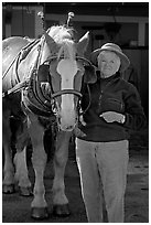 Woman and carriage horse. Beaufort, South Carolina, USA (black and white)