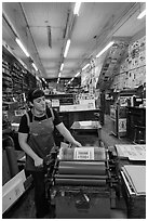 Poster being printed in ink at Hatch Show print. Nashville, Tennessee, USA (black and white)