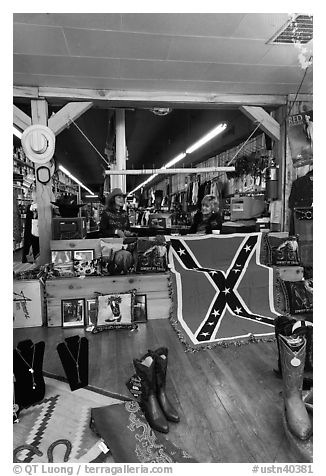 Boots and confederate flag in store. Nashville, Tennessee, USA (black and white)
