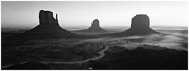 Monument Valley landscape at sunrise. Monument Valley Tribal Park, Navajo Nation, Arizona and Utah, USA (Panoramic black and white)