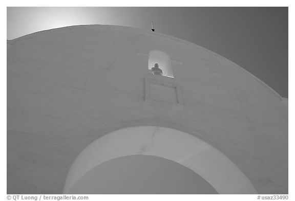 Backlit whitewashed arch, San Xavier del Bac Mission. Tucson, Arizona, USA