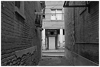 Alley and boarded-up store, Clifton. Arizona, USA ( black and white)