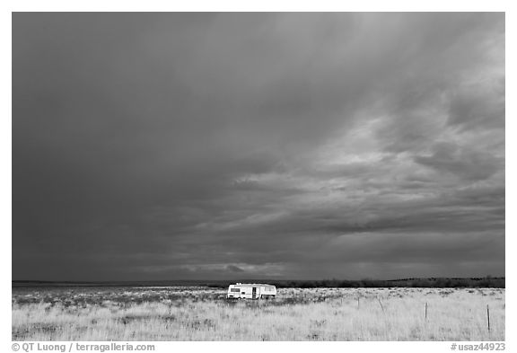 Trailer and storm sky. Arizona, USA