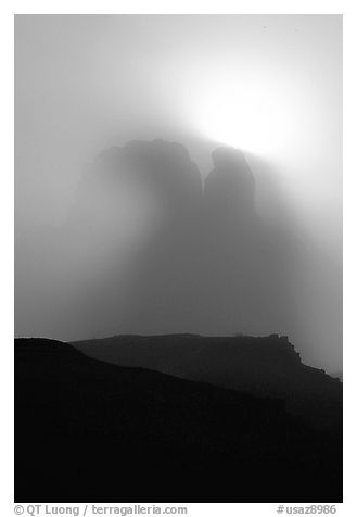 Butte in fog. Monument Valley Tribal Park, Navajo Nation, Arizona and Utah, USA (black and white)