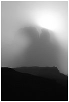 Butte in fog. Monument Valley Tribal Park, Navajo Nation, Arizona and Utah, USA (black and white)