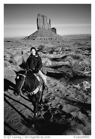Horseback riding. Monument Valley Tribal Park, Navajo Nation, Arizona and Utah, USA