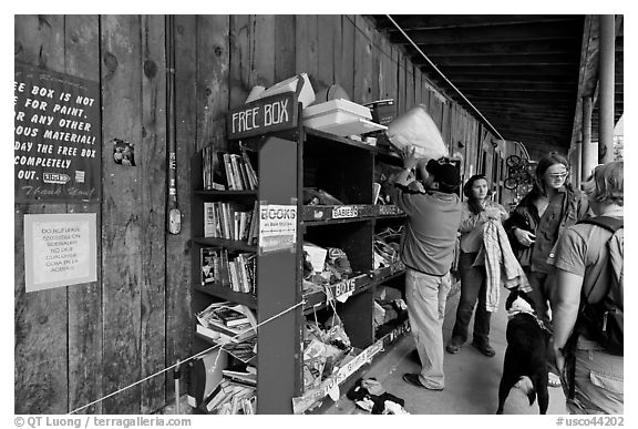 Items being exchanged at the free box. Telluride, Colorado, USA (black and white)