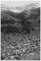 Town, waterfall, and snowy mountains in spring. Telluride, Colorado, USA ( black and white)