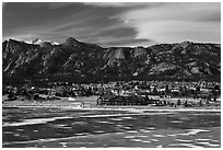 Partly thawed Lake Estes, Estes Park. Colorado, USA ( black and white)