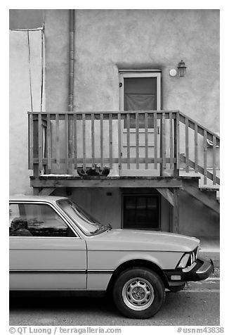 Car and adobe house detail. Taos, New Mexico, USA (black and white)