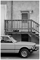 Car and adobe house detail. Taos, New Mexico, USA (black and white)