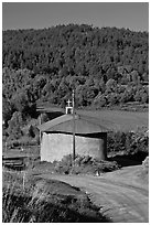 Rural church with adobe walls and tin roof. New Mexico, USA (black and white)
