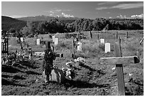 Crosses and headstones, cemetery, Picuris Pueblo. New Mexico, USA (black and white)