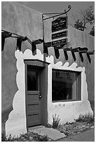 Door, window, and sign indicating oldest house. Santa Fe, New Mexico, USA (black and white)