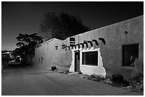 Street in Bario de Analco by night. Santa Fe, New Mexico, USA (black and white)
