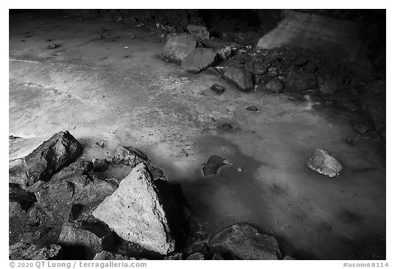 Rocks and ice in collapsed lava tube. El Malpais National Monument, New Mexico, USA (black and white)