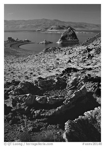 Tufa rock and pyramid. Pyramid Lake, Nevada, USA (black and white)