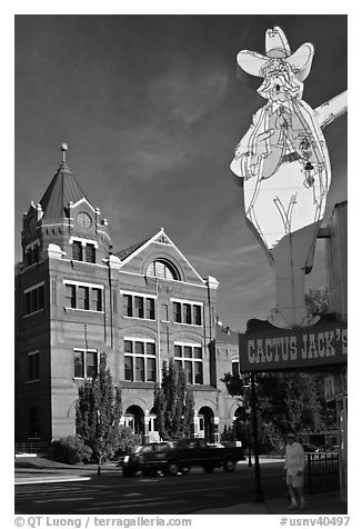 Giant Cactus Jack sign and brick building. Carson City, Nevada, USA (black and white)