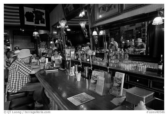 Man sitting at bar. Virginia City, Nevada, USA (black and white)