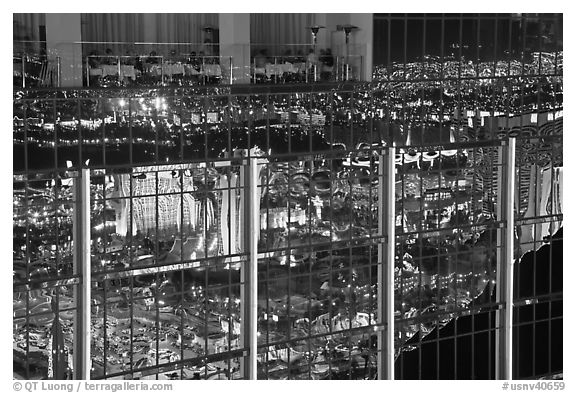 Restaurant and city reflections on glass windows, the Hotel at Mandalay Bay. Las Vegas, Nevada, USA (black and white)