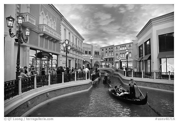 Gondolas and Grand Canal bordered by shops in the Venetian casino. Las Vegas, Nevada, USA (black and white)