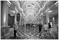 Gallery and accordeon player, Venetian casino. Las Vegas, Nevada, USA ( black and white)