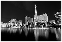 Paris casino and Bellagio fountains by night. Las Vegas, Nevada, USA ( black and white)